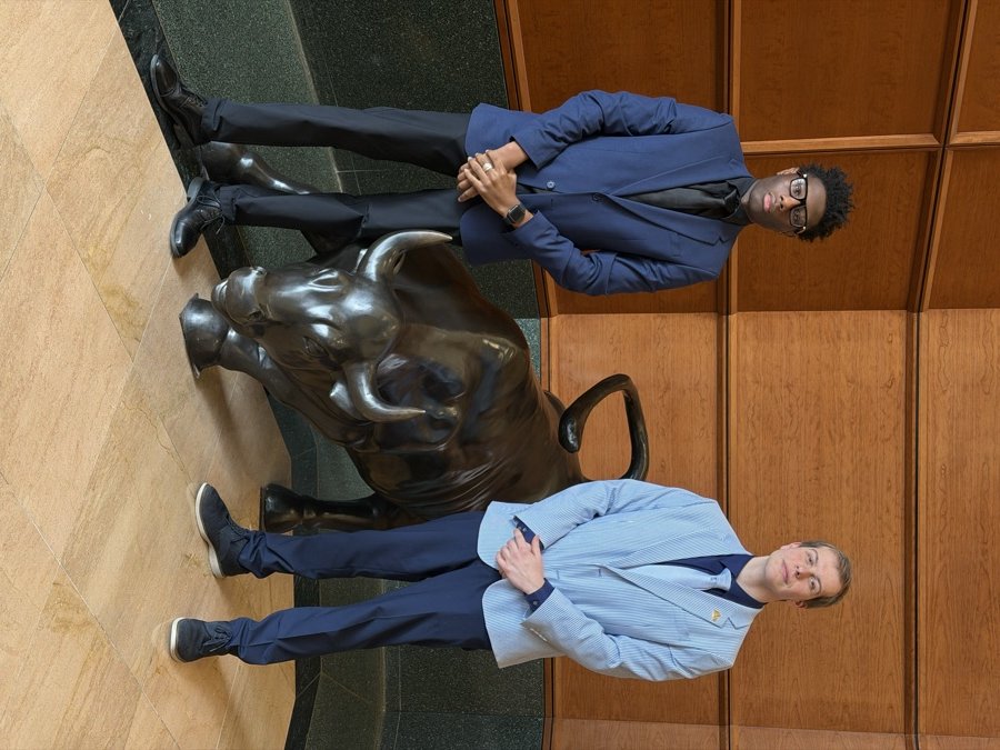 Two Rochester Talent Group team members in professional business attire at the Rochester office